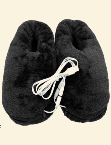 Close-up of Warmweave™ USB Heated Slippers in black, featuring a soft plush texture and a coiled USB cable attached at the center. Designed for cozy warmth and easy power via USB connection.